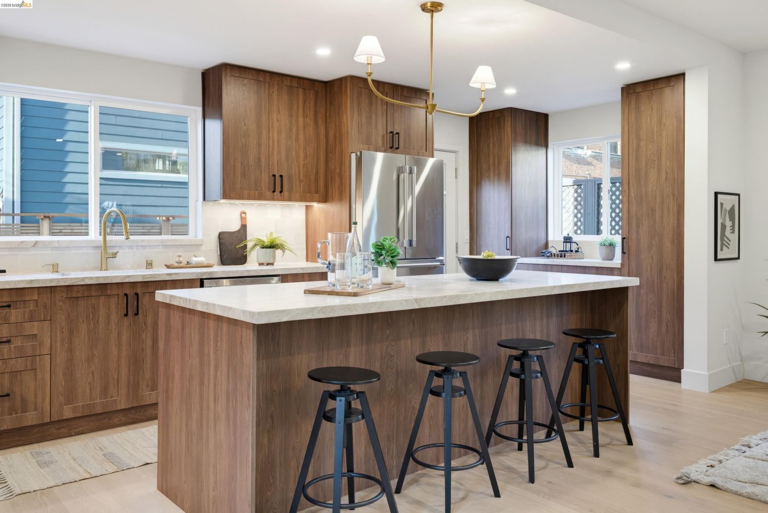Berkeley custom kitchen with walnut cabinetry and large island by Millwork USA