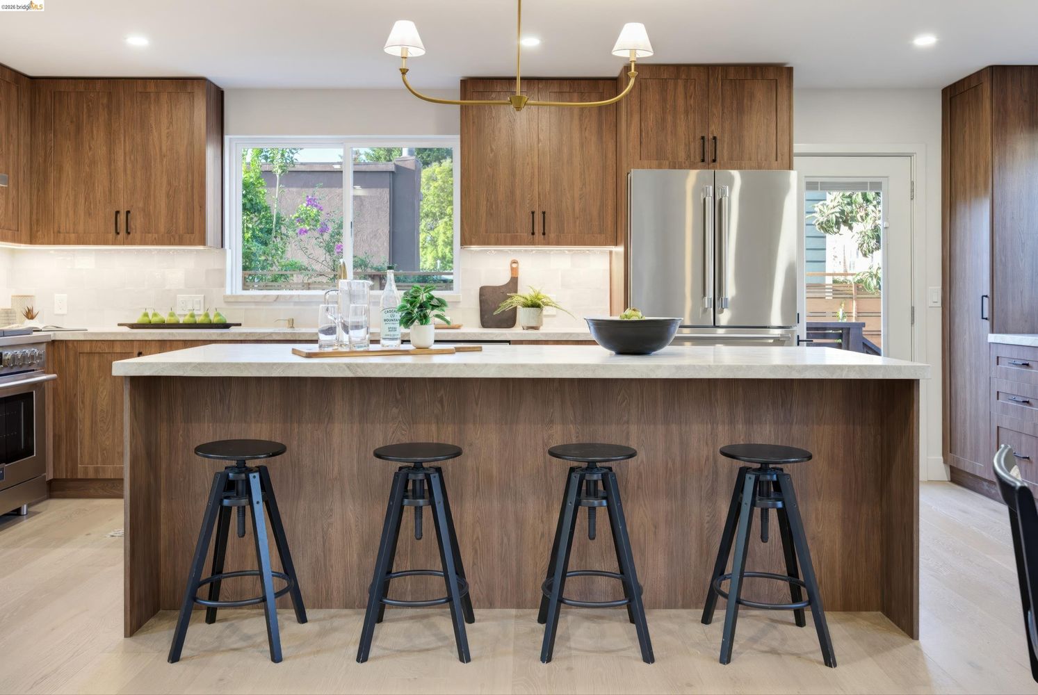 Berkeley kitchen island and full-height custom cabinetry by Millwork USA