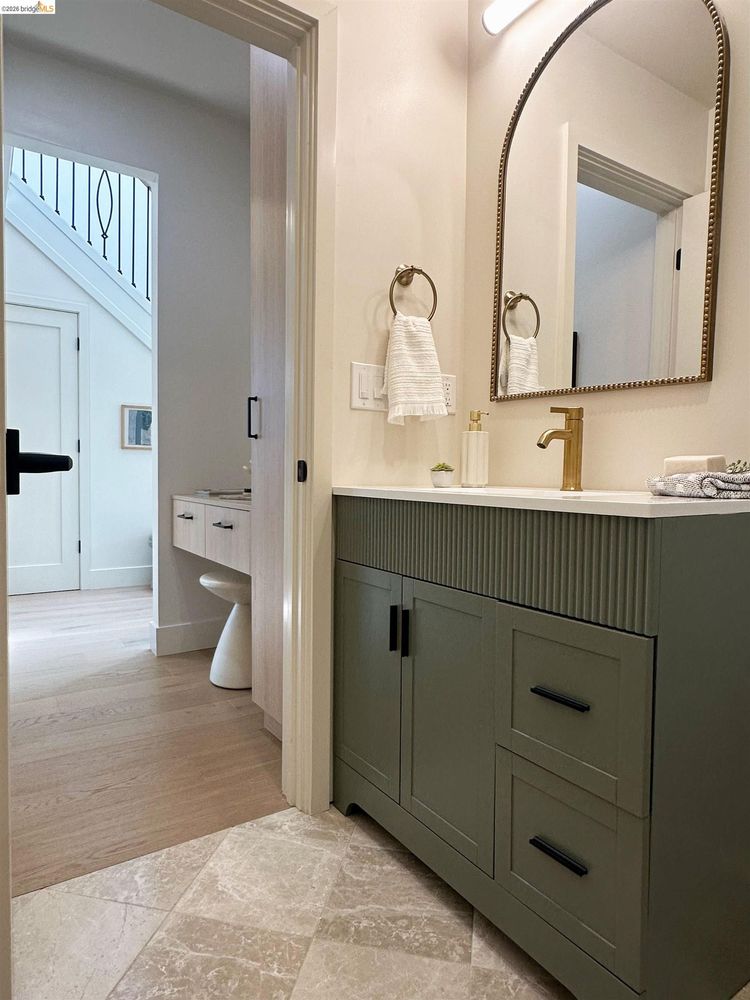 Berkeley powder room painted vanity cabinetry by Millwork USA