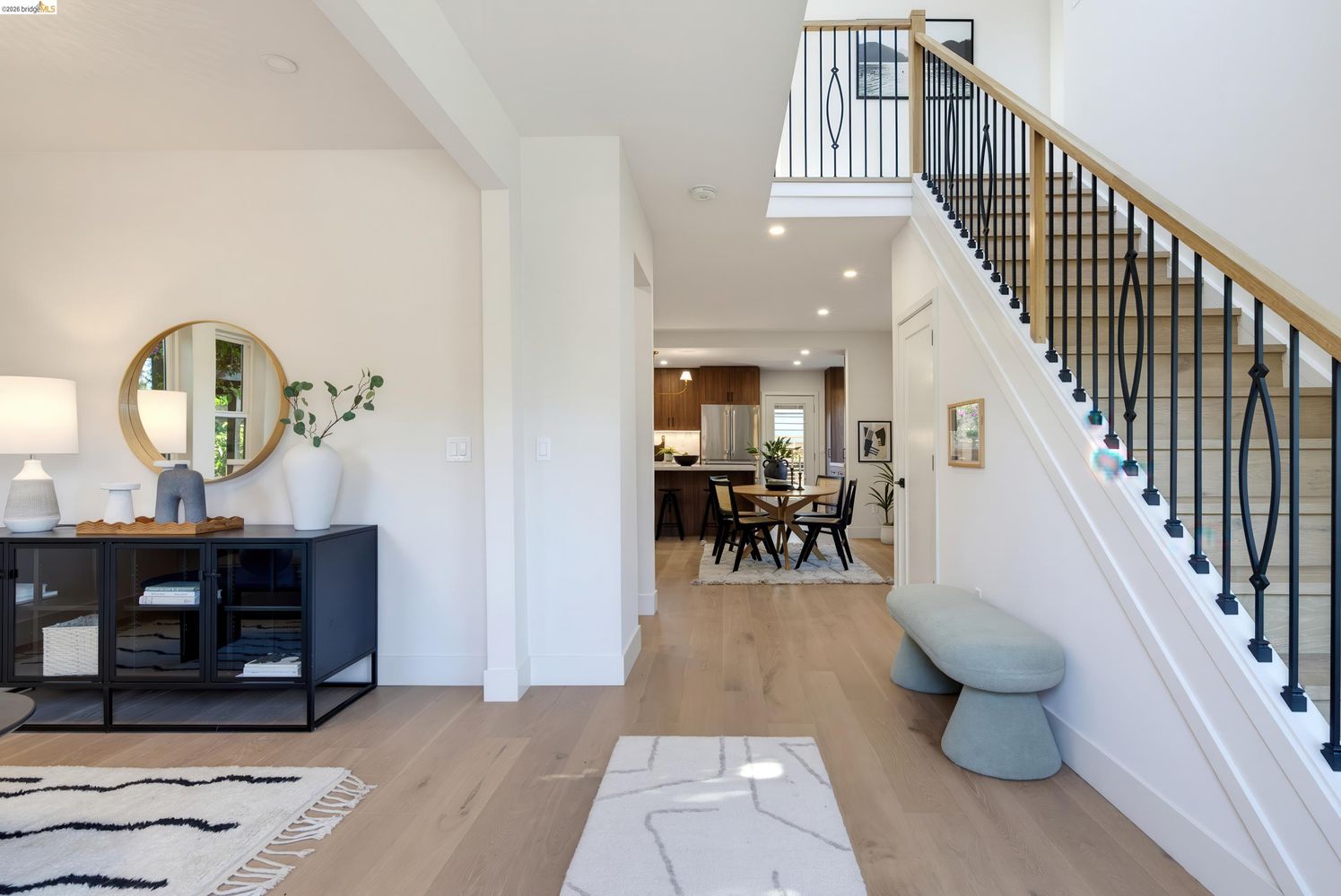 Berkeley residence architectural context with custom kitchen cabinetry visible beyond